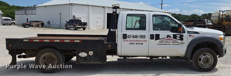 image for item ED2137 2013 Ford F550 Super Duty Crew Cab flatbed truck