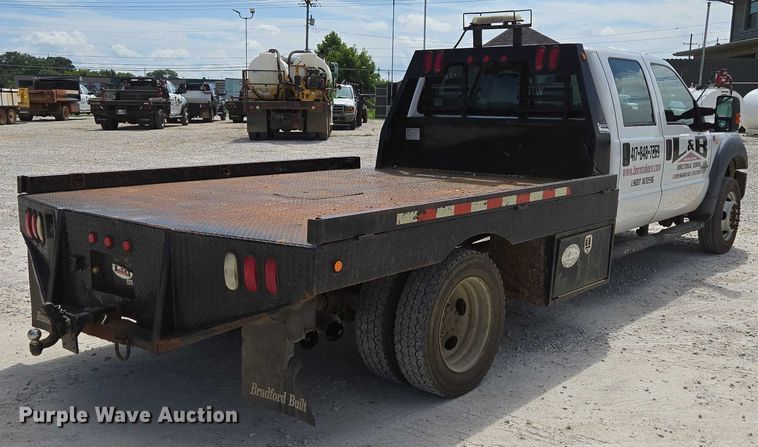 image for item ED2137 2013 Ford F550 Super Duty Crew Cab flatbed truck