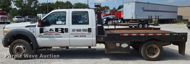 image for item ED2137 2013 Ford F550 Super Duty Crew Cab flatbed truck