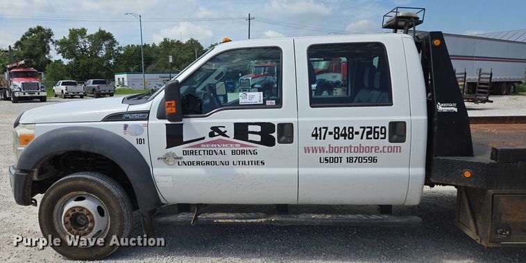 image for item ED2137 2013 Ford F550 Super Duty Crew Cab flatbed truck