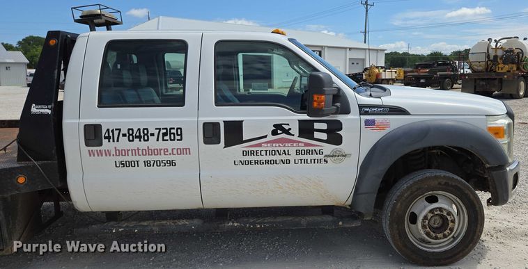 image for item ED2137 2013 Ford F550 Super Duty Crew Cab flatbed truck