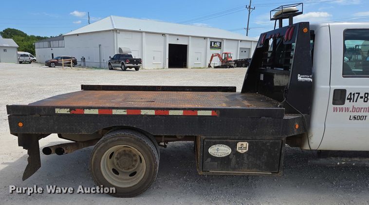 image for item ED2137 2013 Ford F550 Super Duty Crew Cab flatbed truck