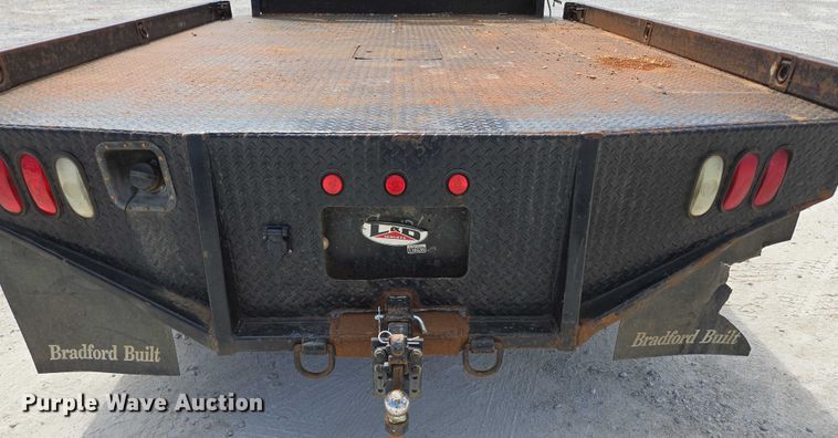 image for item ED2137 2013 Ford F550 Super Duty Crew Cab flatbed truck