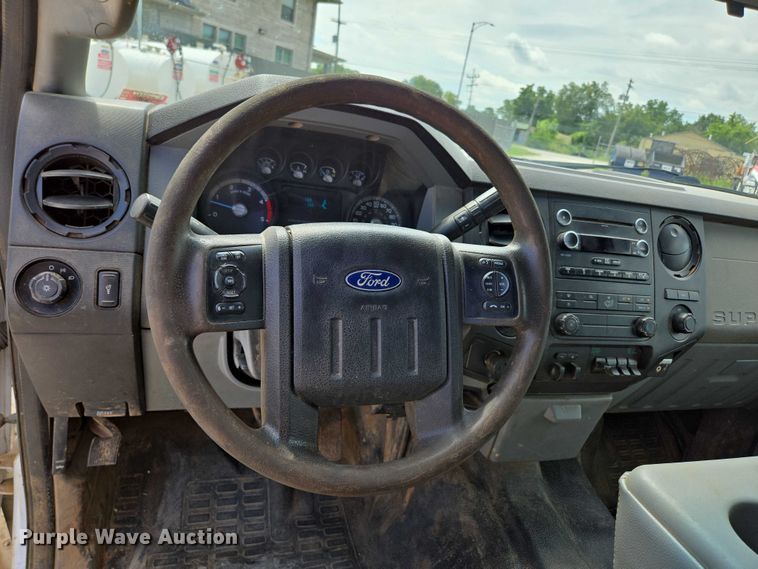 image for item ED2137 2013 Ford F550 Super Duty Crew Cab flatbed truck