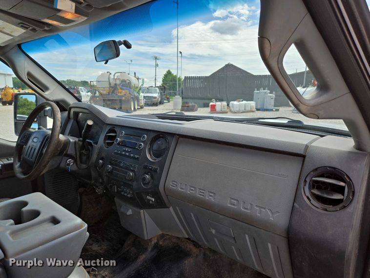 image for item ED2137 2013 Ford F550 Super Duty Crew Cab flatbed truck