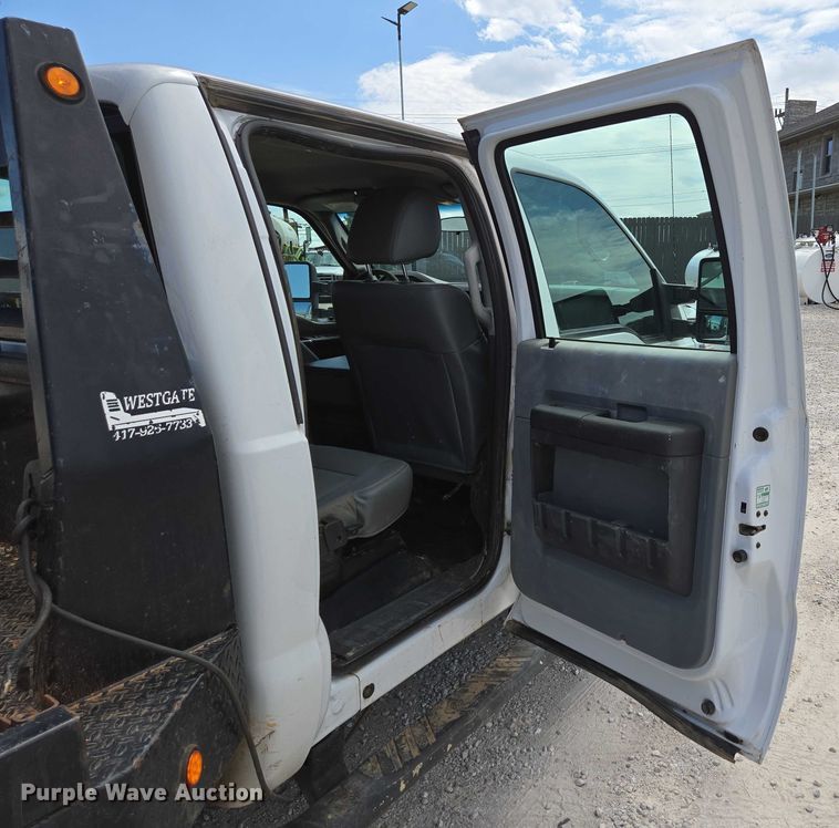 image for item ED2137 2013 Ford F550 Super Duty Crew Cab flatbed truck