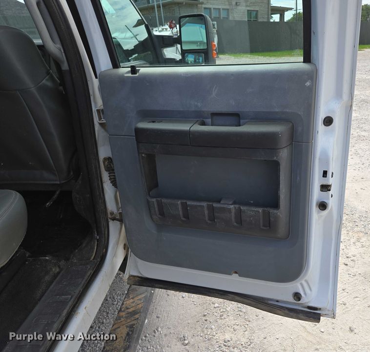 image for item ED2137 2013 Ford F550 Super Duty Crew Cab flatbed truck