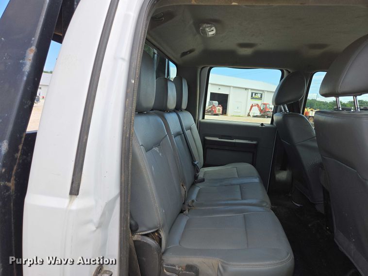 image for item ED2137 2013 Ford F550 Super Duty Crew Cab flatbed truck