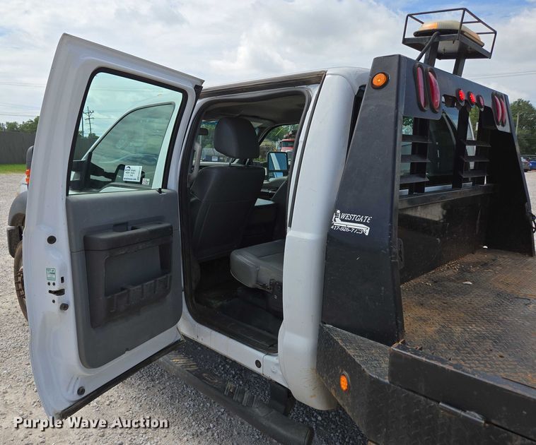 image for item ED2137 2013 Ford F550 Super Duty Crew Cab flatbed truck