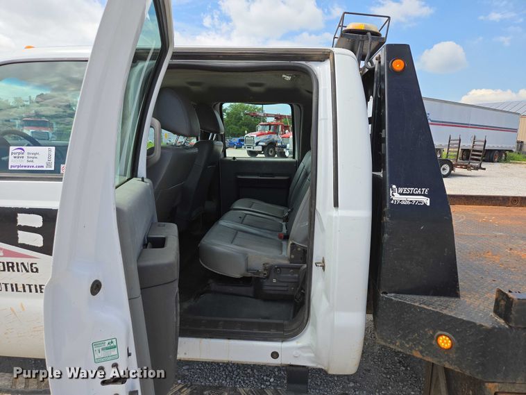image for item ED2137 2013 Ford F550 Super Duty Crew Cab flatbed truck