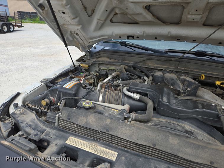 image for item ED2137 2013 Ford F550 Super Duty Crew Cab flatbed truck