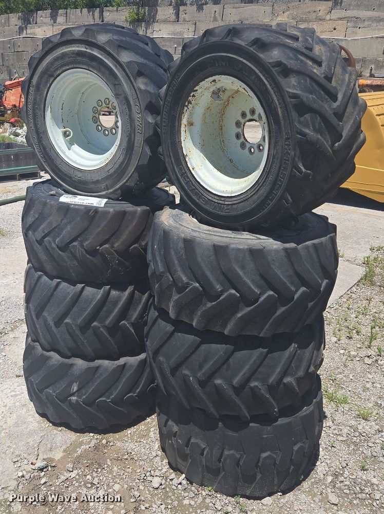 image for item EF1706 (8) 13x15.50-15 tires and wheels