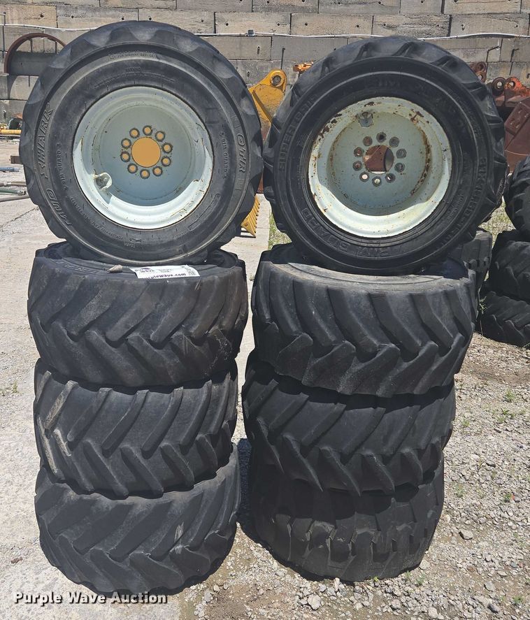 image for item EF1706 (8) 13x15.50-15 tires and wheels