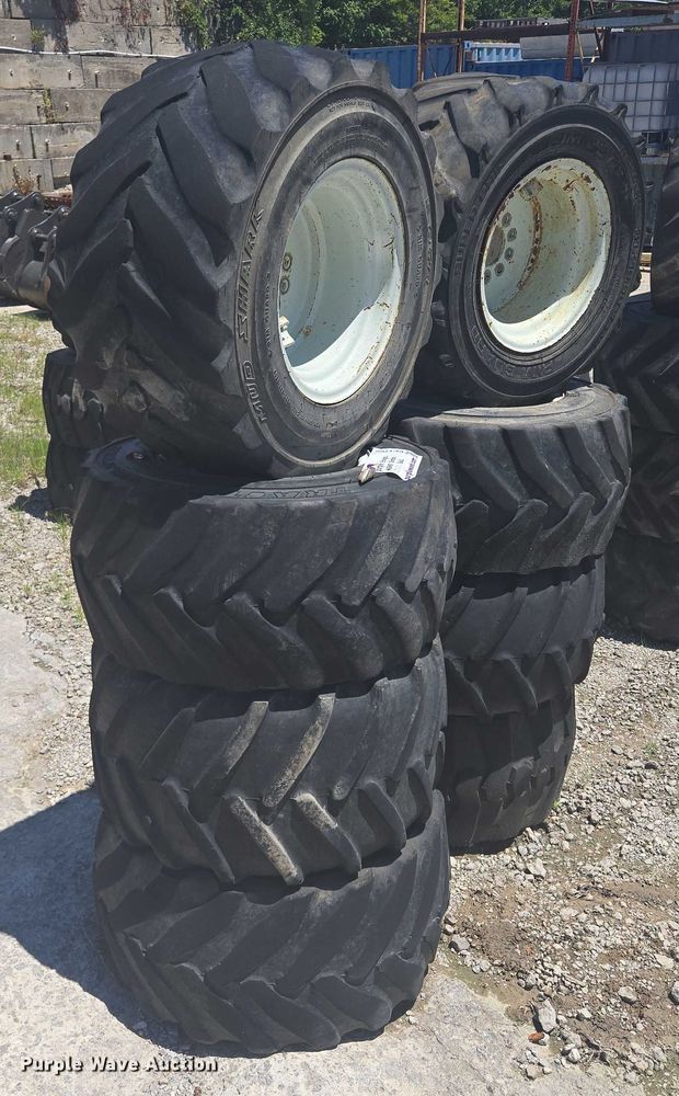 image for item EF1706 (8) 13x15.50-15 tires and wheels