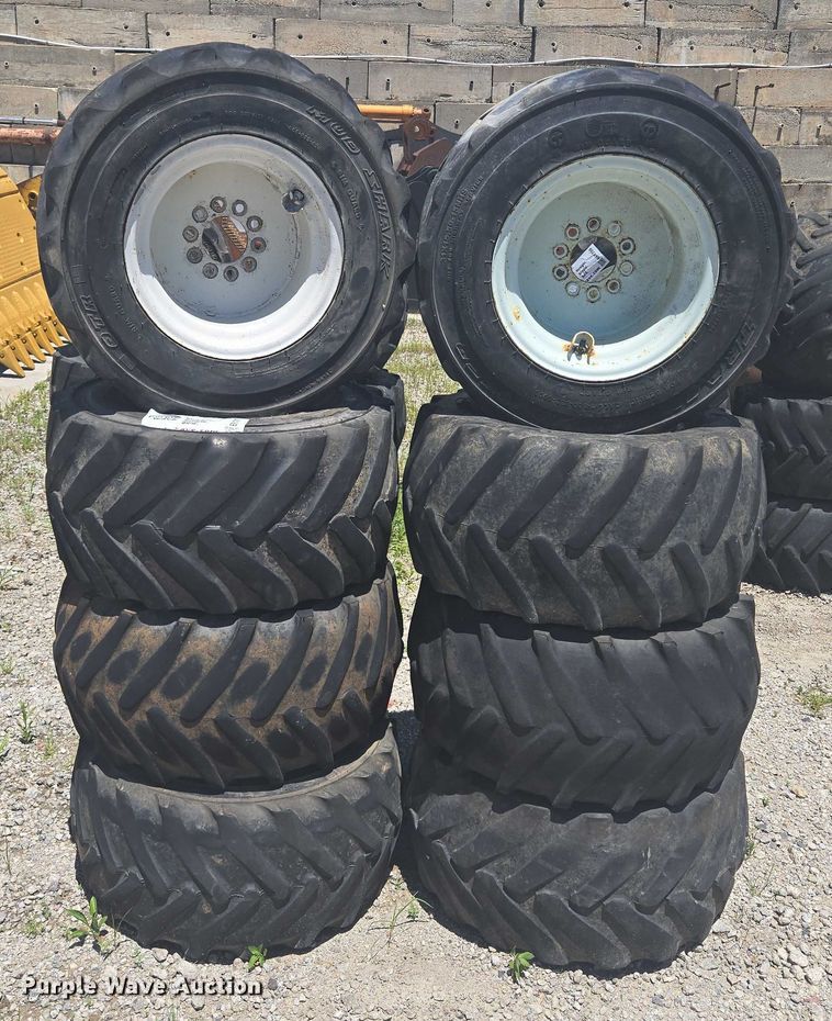 image for item EF1707 (8) 13x15.50-15 tires and wheels