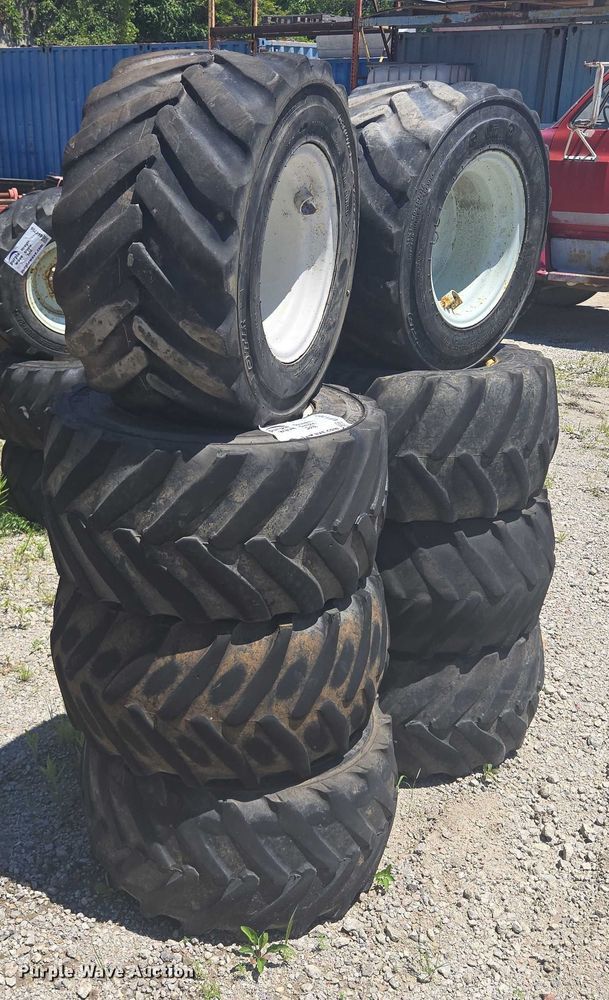 image for item EF1707 (8) 13x15.50-15 tires and wheels