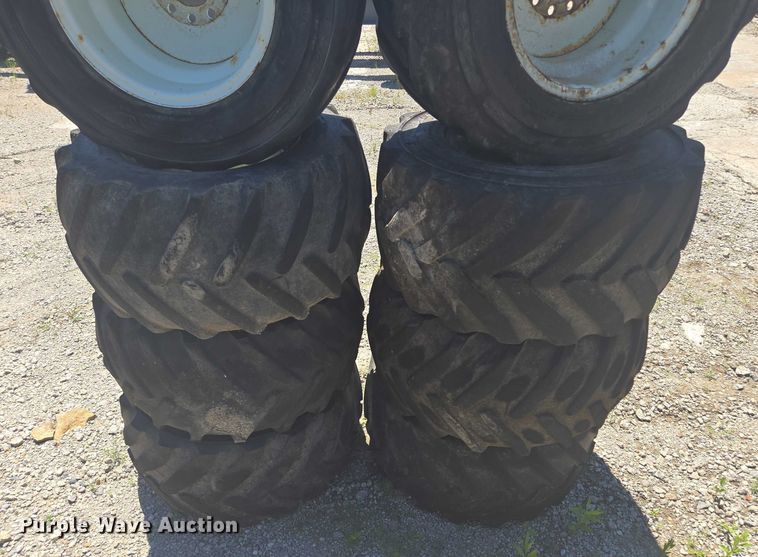 image for item EF1707 (8) 13x15.50-15 tires and wheels