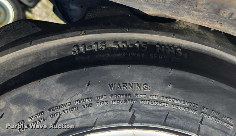 image for item EF1707 (8) 13x15.50-15 tires and wheels