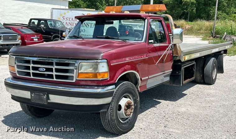 image for item EK8334 1993 Ford F450 Super Duty rollback truck