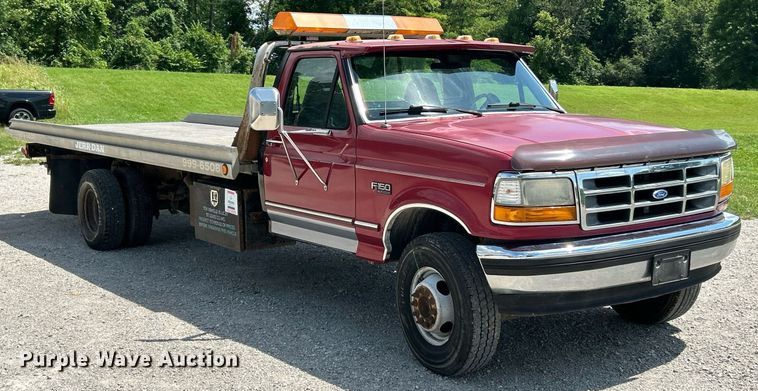 image for item EK8334 1993 Ford F450 Super Duty rollback truck