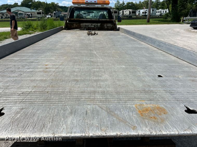 image for item EK8334 1993 Ford F450 Super Duty rollback truck