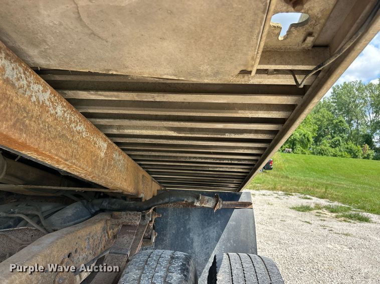 image for item EK8334 1993 Ford F450 Super Duty rollback truck