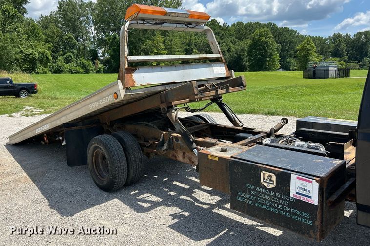 image for item EK8334 1993 Ford F450 Super Duty rollback truck