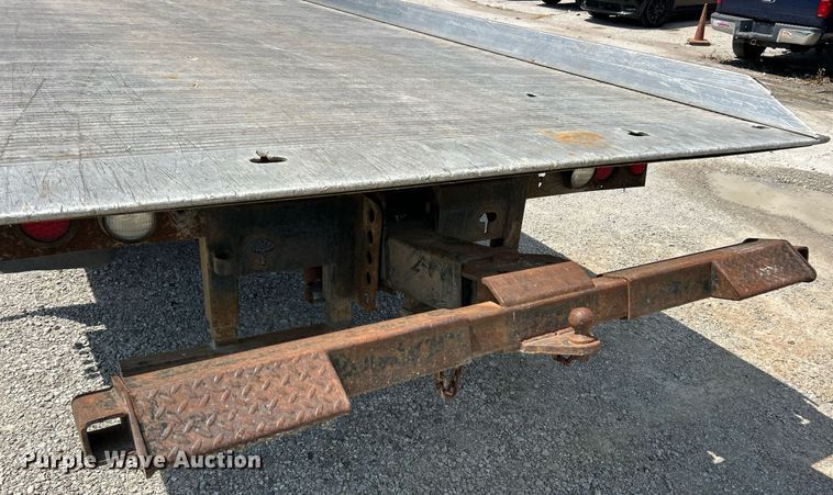 image for item EK8334 1993 Ford F450 Super Duty rollback truck