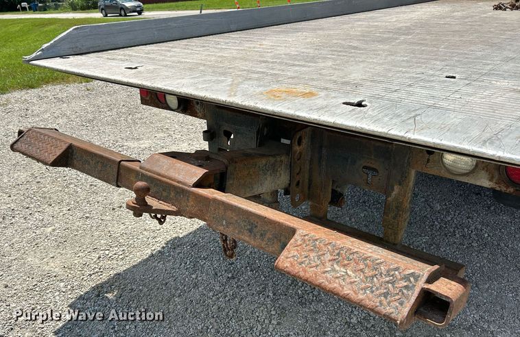 image for item EK8334 1993 Ford F450 Super Duty rollback truck