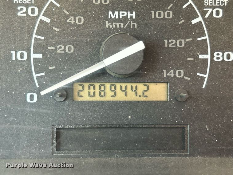 image for item EK8334 1993 Ford F450 Super Duty rollback truck