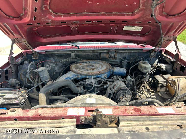 image for item EK8334 1993 Ford F450 Super Duty rollback truck