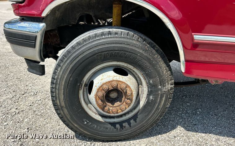 image for item EK8334 1993 Ford F450 Super Duty rollback truck