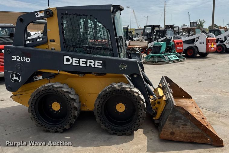 MINI CARGADOR SOBRE RUEDAS 2010 JOHN DEERE 320D