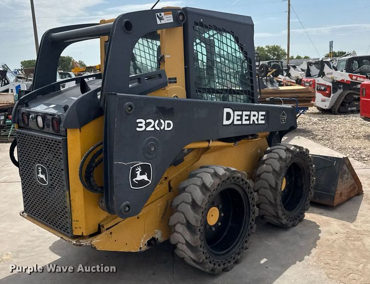 MINI CARGADOR SOBRE RUEDAS 2010 JOHN DEERE 320D