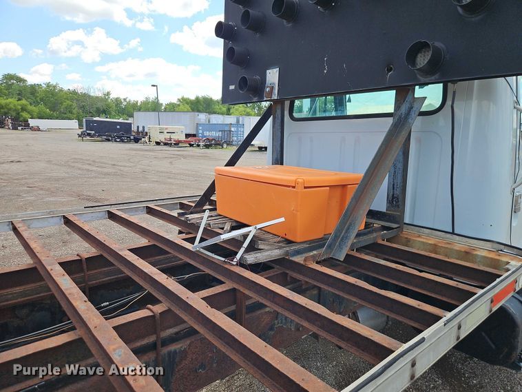 image for item EB8170 1999 International 4700 flatbed truck with crash attenuator