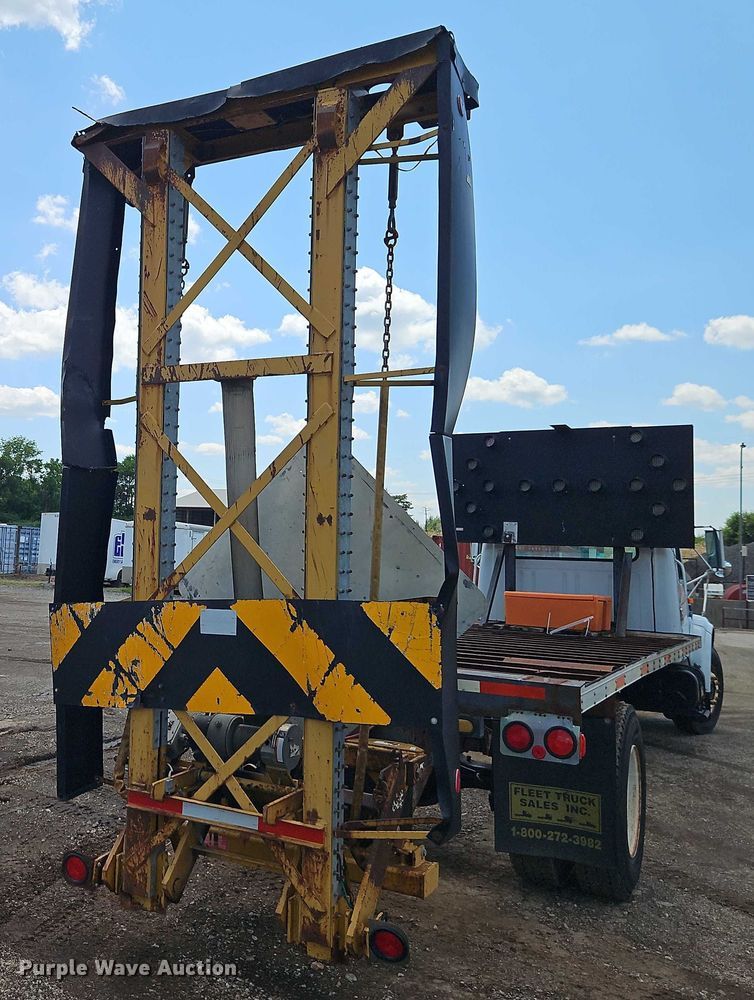 image for item EB8170 1999 International 4700 flatbed truck with crash attenuator