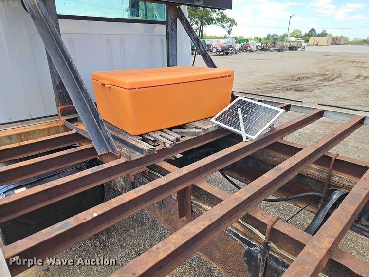 image for item EB8170 1999 International 4700 flatbed truck with crash attenuator