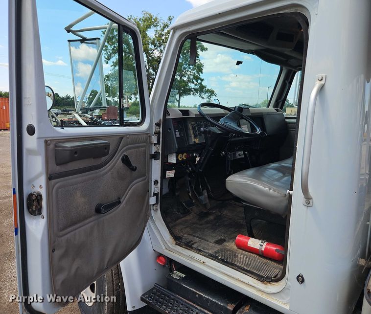 image for item EB8170 1999 International 4700 flatbed truck with crash attenuator