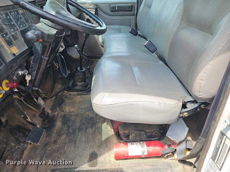 image for item EB8170 1999 International 4700 flatbed truck with crash attenuator