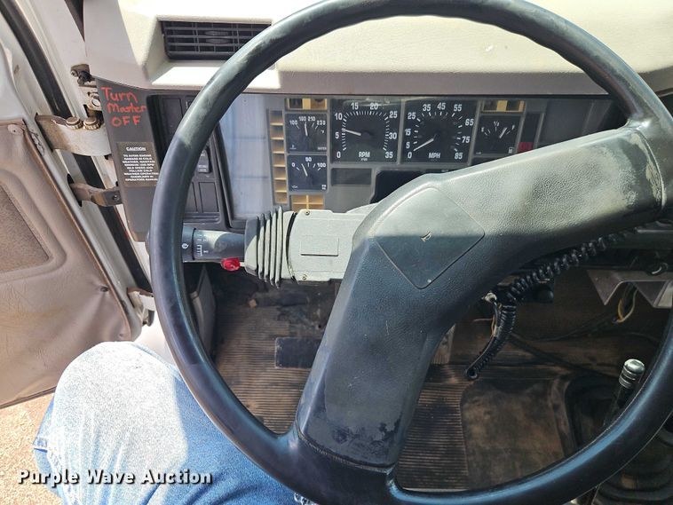 image for item EB8170 1999 International 4700 flatbed truck with crash attenuator