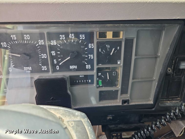 image for item EB8170 1999 International 4700 flatbed truck with crash attenuator