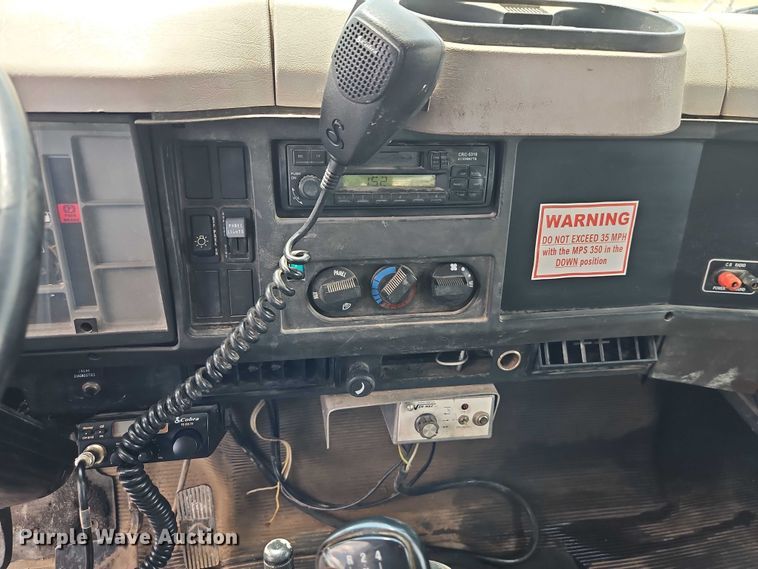 image for item EB8170 1999 International 4700 flatbed truck with crash attenuator