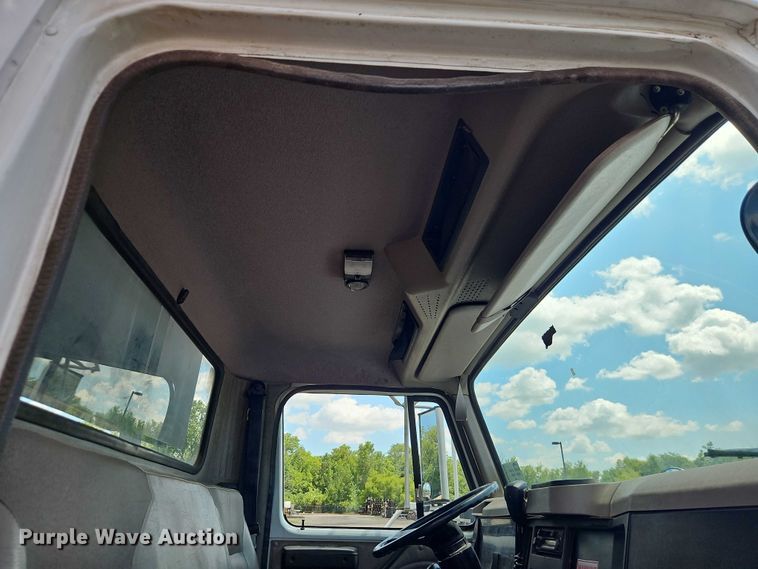 image for item EB8170 1999 International 4700 flatbed truck with crash attenuator