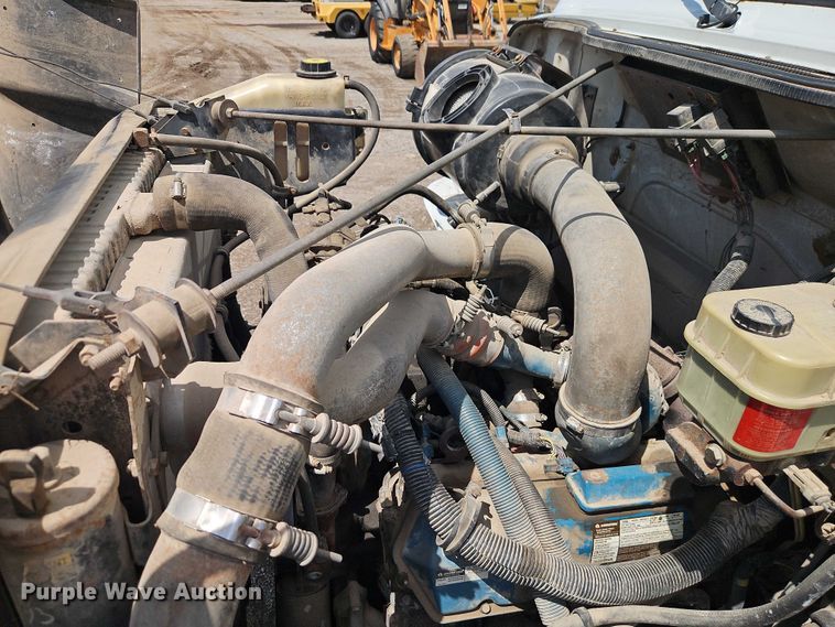 image for item EB8170 1999 International 4700 flatbed truck with crash attenuator