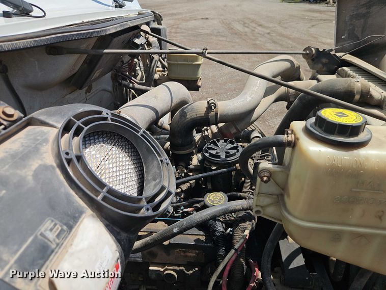 image for item EB8170 1999 International 4700 flatbed truck with crash attenuator