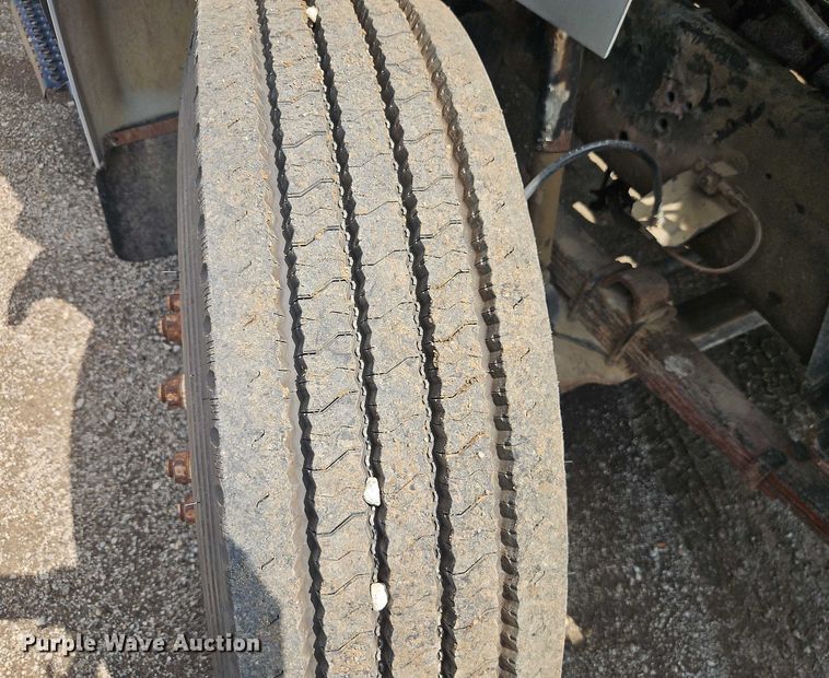 image for item EB8170 1999 International 4700 flatbed truck with crash attenuator