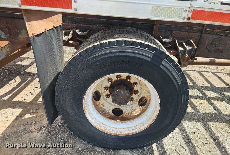 image for item EB8170 1999 International 4700 flatbed truck with crash attenuator