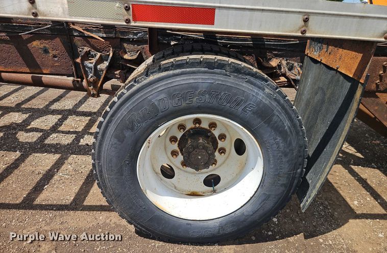 image for item EB8170 1999 International 4700 flatbed truck with crash attenuator