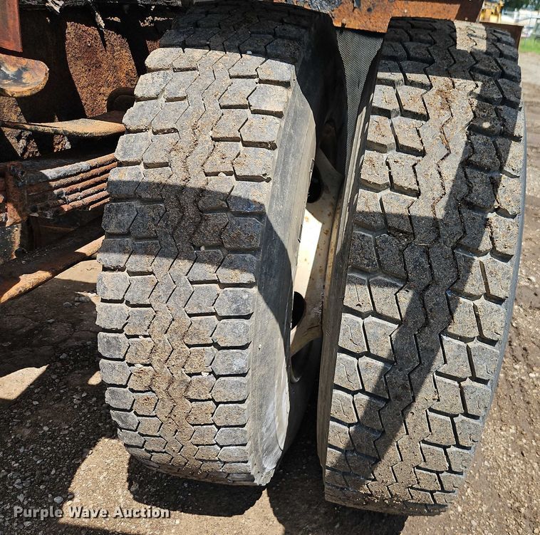 image for item EB8170 1999 International 4700 flatbed truck with crash attenuator