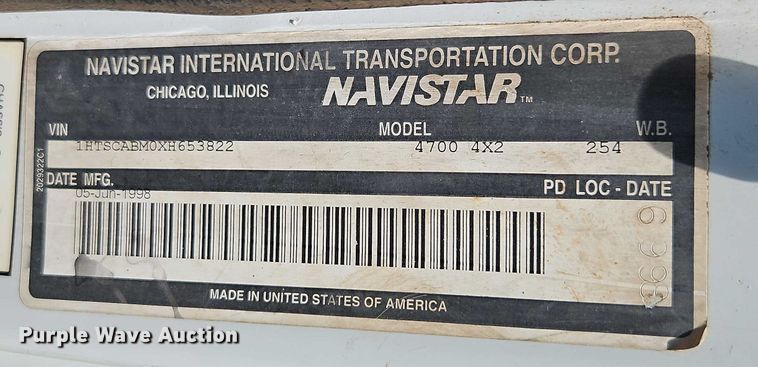 image for item EB8170 1999 International 4700 flatbed truck with crash attenuator